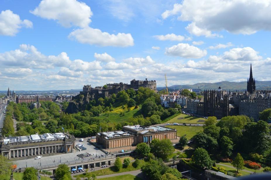 Overview of Edinburgh featuring church spire and castle